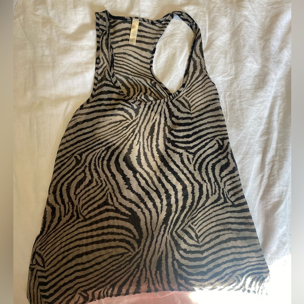 Sheer top - partial open back.